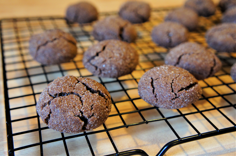 Chocolate Snickerdoodles on wire cooling rack