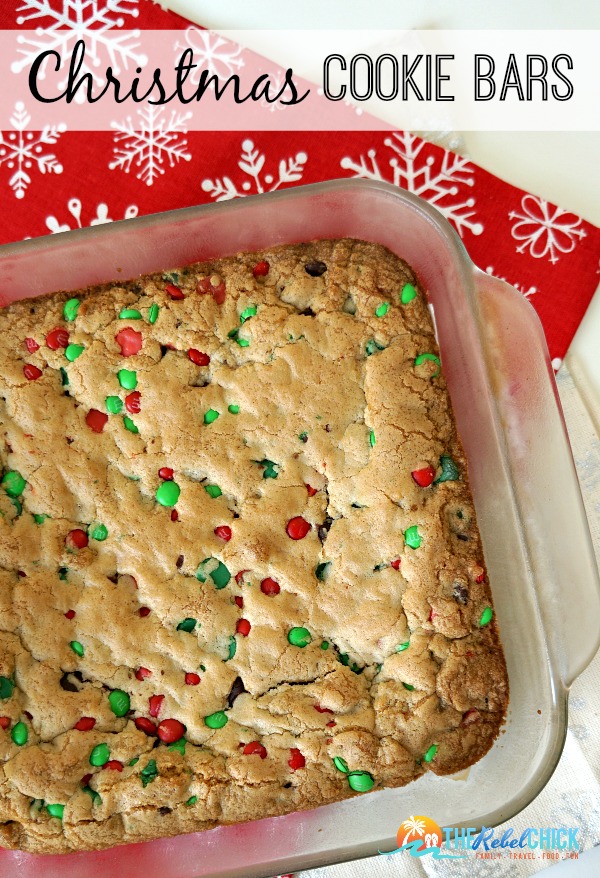 This easy Christmas Cookie Bars recipe is made with Holiday M&M's and Red and Green Nestle Toll House morsels. They're so fun and so festive!