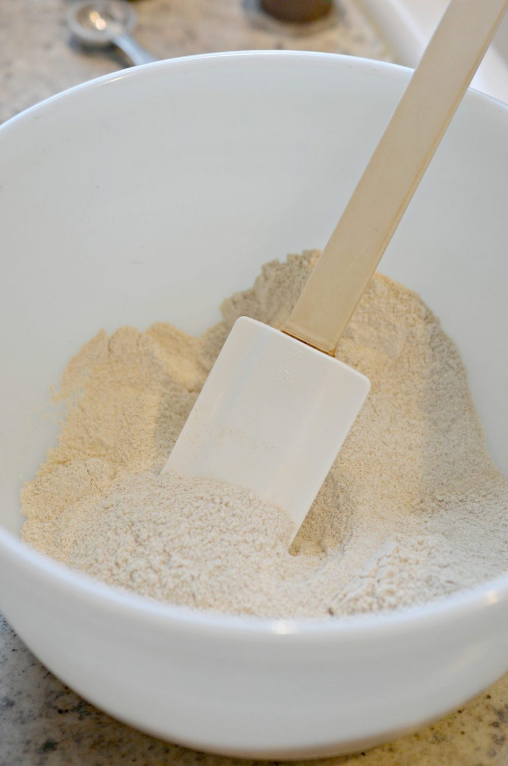 Mixing dry ingredients in a mixing bowl 