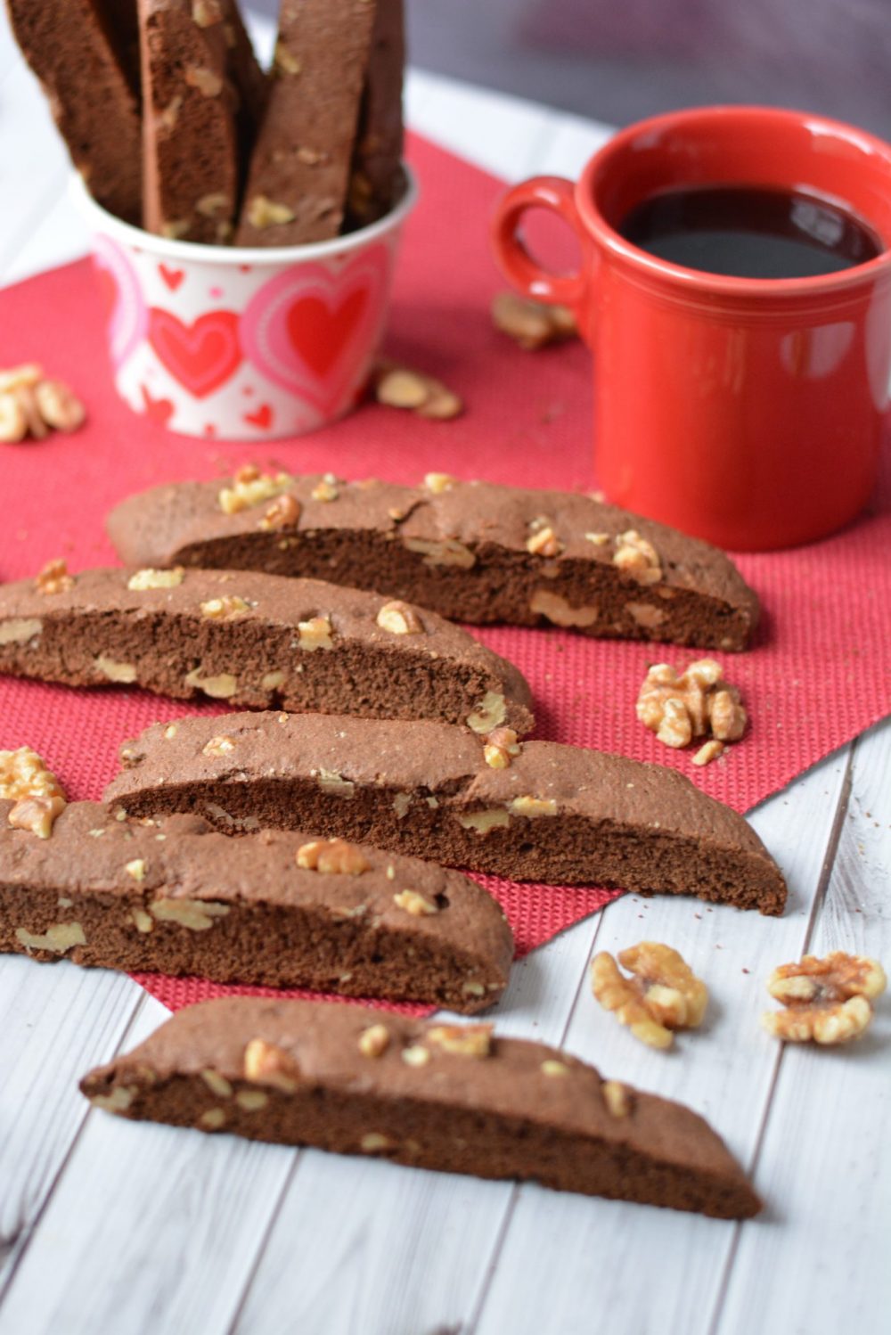 Chocolate Walnut Biscotti laid out on a red napkin