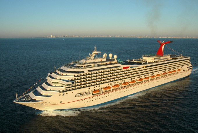 The Carnival Valor cruises off Miami on the Atlantic Ocean. Sailing on year-round, weekly alternating eastern and western Caribbean cruises, the 952-foot-long cruise ship accommodates almost 3,000 guests and is the first ship in Carnival's fleet to offer full wireless internet access in all public areas including cabins. (Photo by Andy Newman/Carnival Cruise Lines)