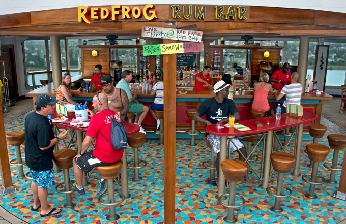 Guests aboard the Carnival Freedom enjoy refreshments at the ship's poolside Red Frog Rum Bar. (Andy Newman/Carnival Cruise Lines)