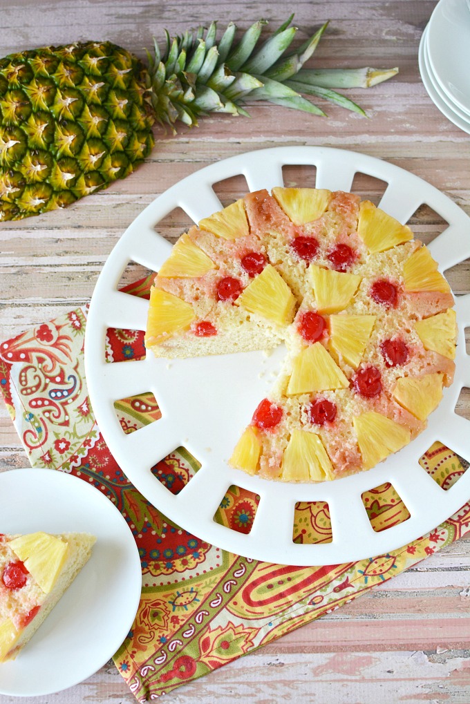 white cake with pineapple and maraschino cherries