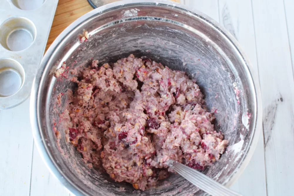 Cranberry Almond Muffin dough in a large mixing bowl