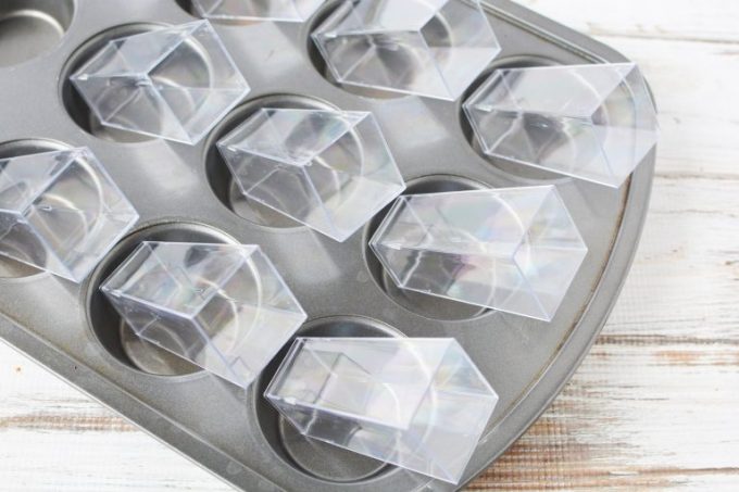 dessert cups in the muffin tin at an angle