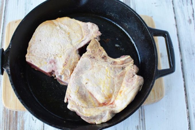 chops in a cast iron skillet
