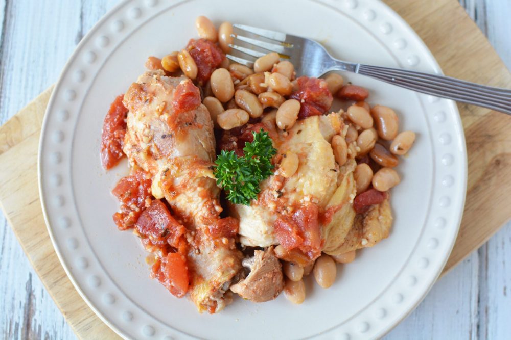  A plate of chicken and beans.