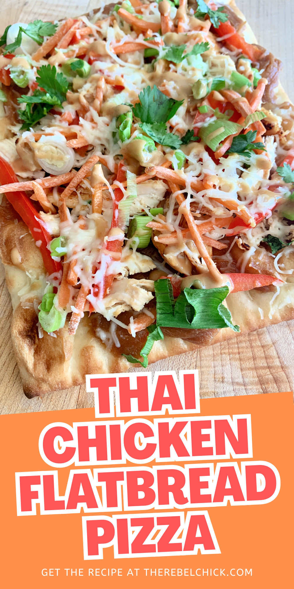 Thai Chicken Pizza covered in chicken and veggies and cheese on a plate with lime wedges