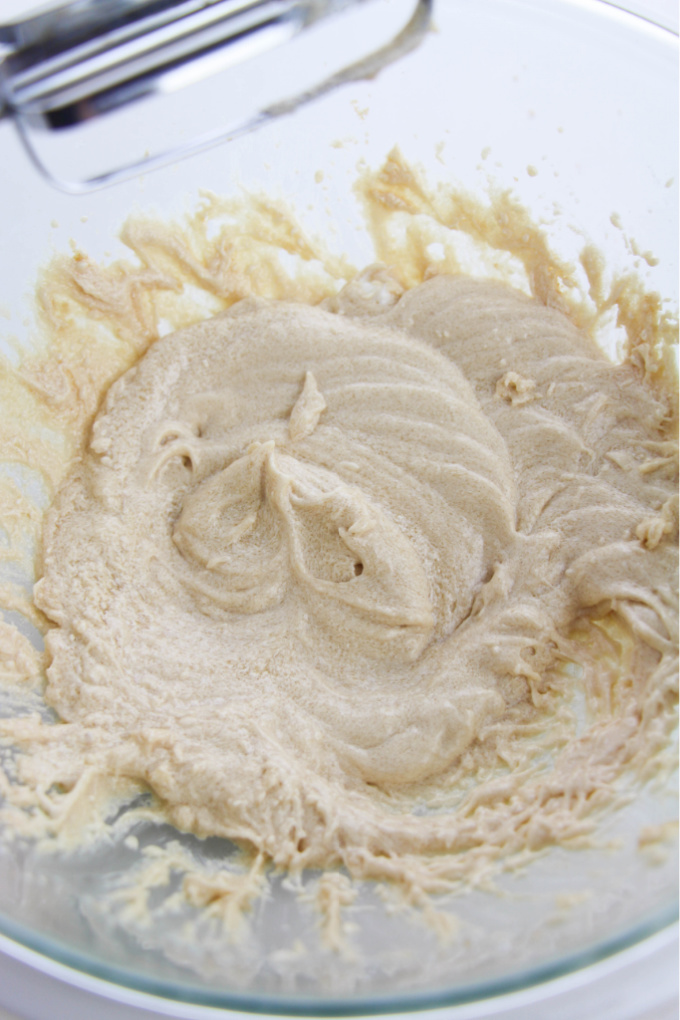 brown sugar and white sugar creamed with butter in a bowl