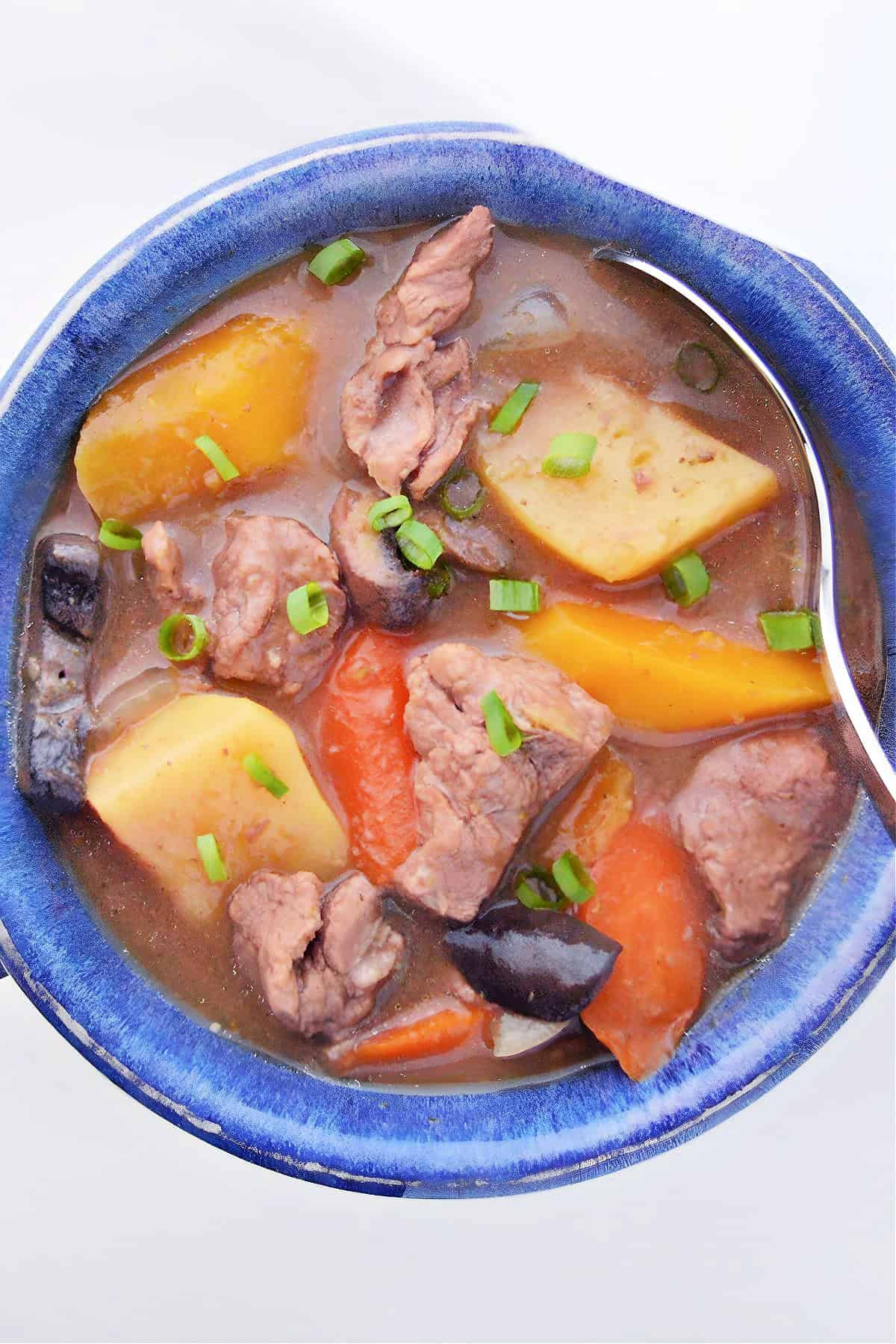 Slow Cooker Beef Vegetable Stew in a blue bowl