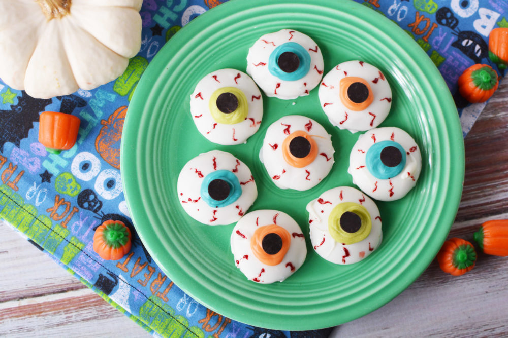 eyeball cookies on a green plate