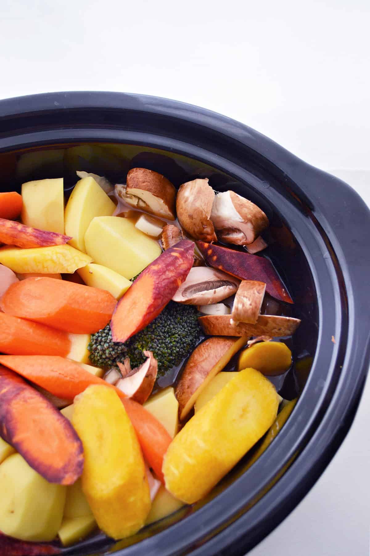 Slow Cooker Beef Vegetable Stew in a blue bowl