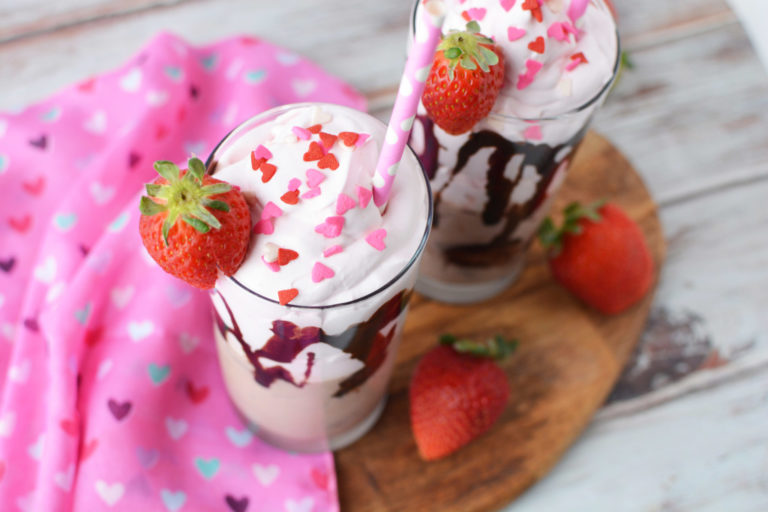 Fresh Strawberries and Valentine's Day sprinkles in a Chocolate Dalgona Drink 