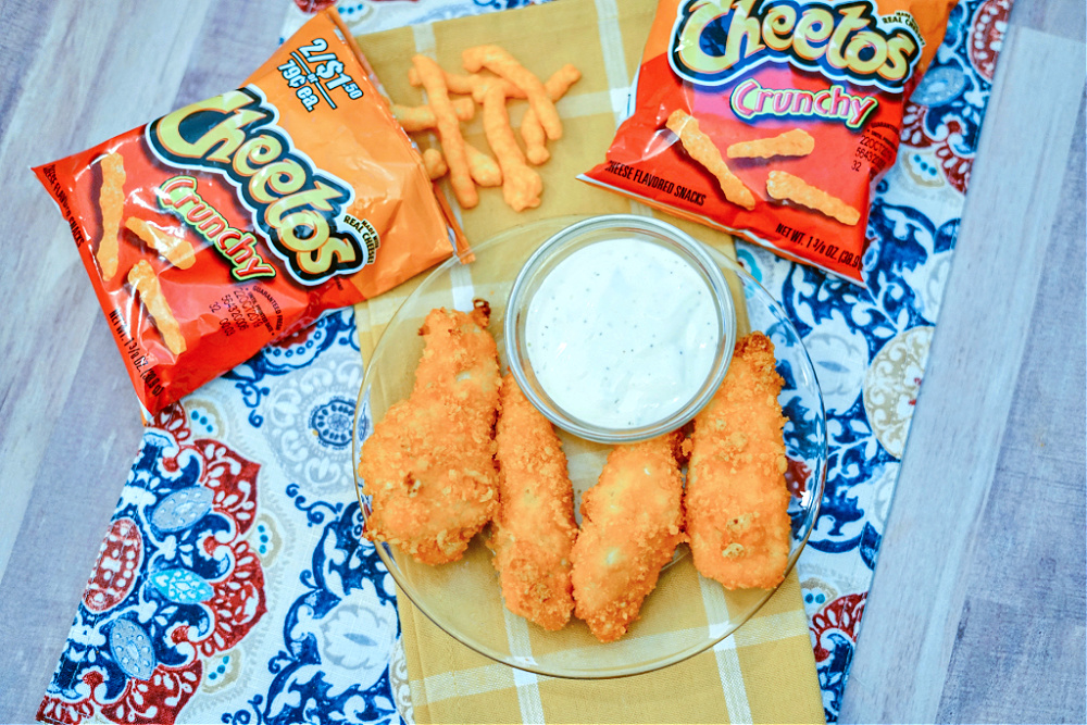 tenderloins with coating and a bowl of ranch dipping sauce
