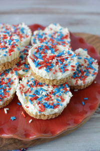 This Patriotic Red White & Blue Cheesecakes Recipe is going to be the hit of your Memorial Day and 4th of July Barbecues this summer! 