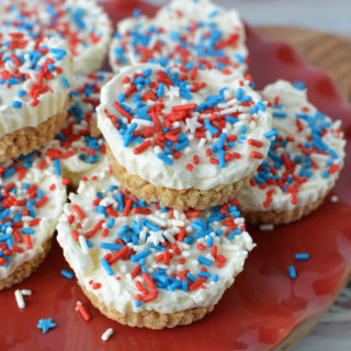 This Patriotic Red White & Blue Cheesecakes Recipe is going to be the hit of your Memorial Day and 4th of July Barbecues this summer! 