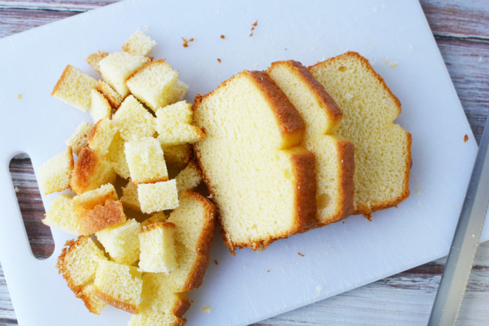 Cutting pound cake into cubes