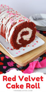 Red Velvet Roll Using Cake Mix covered in white frosting and Valentine's day sprinkles