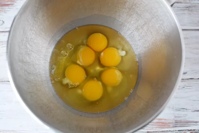 eggs in a stainless steel measuring bowl