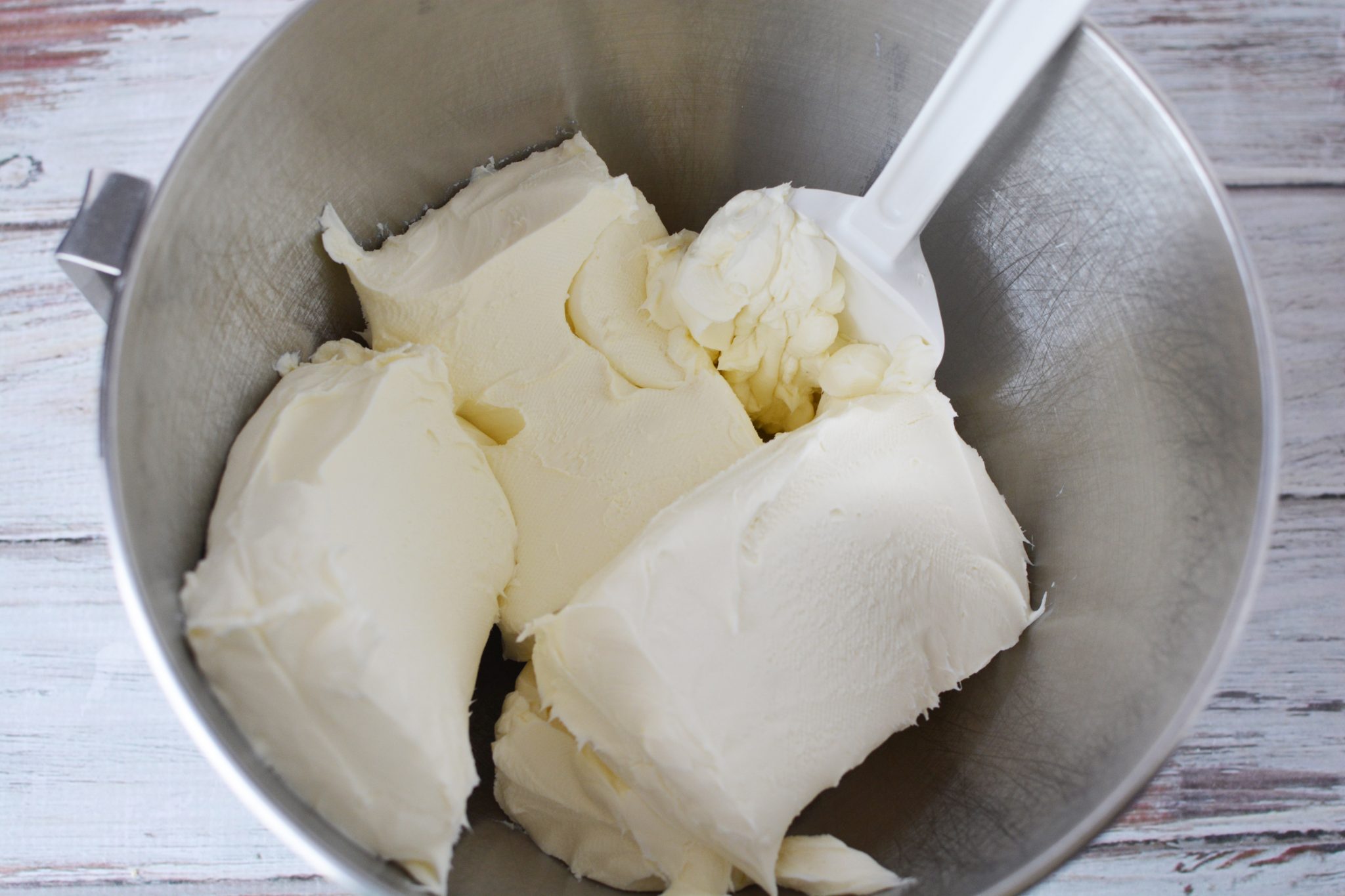cream cheese in a mixing bowl