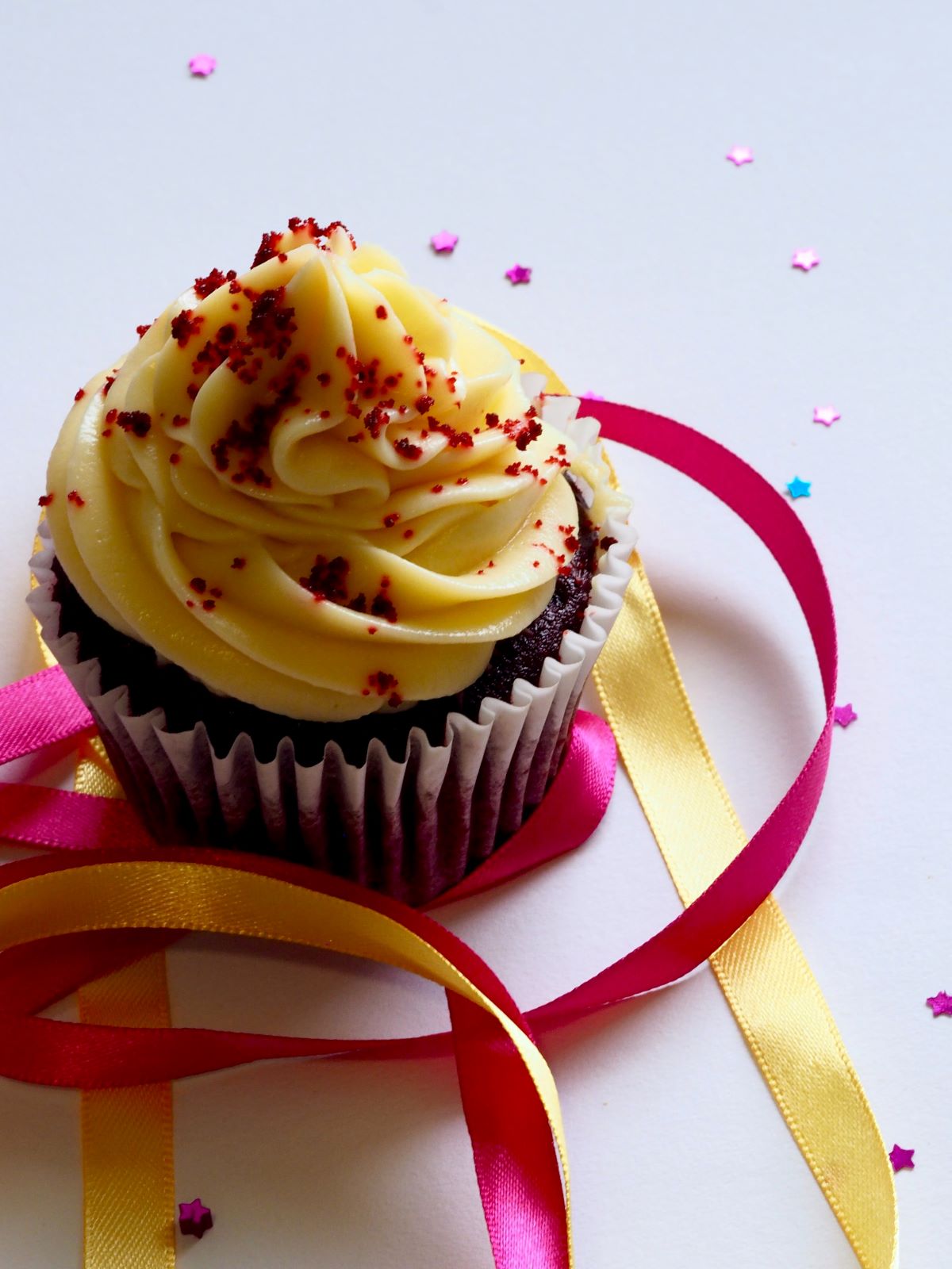 cupcake with party ribbons