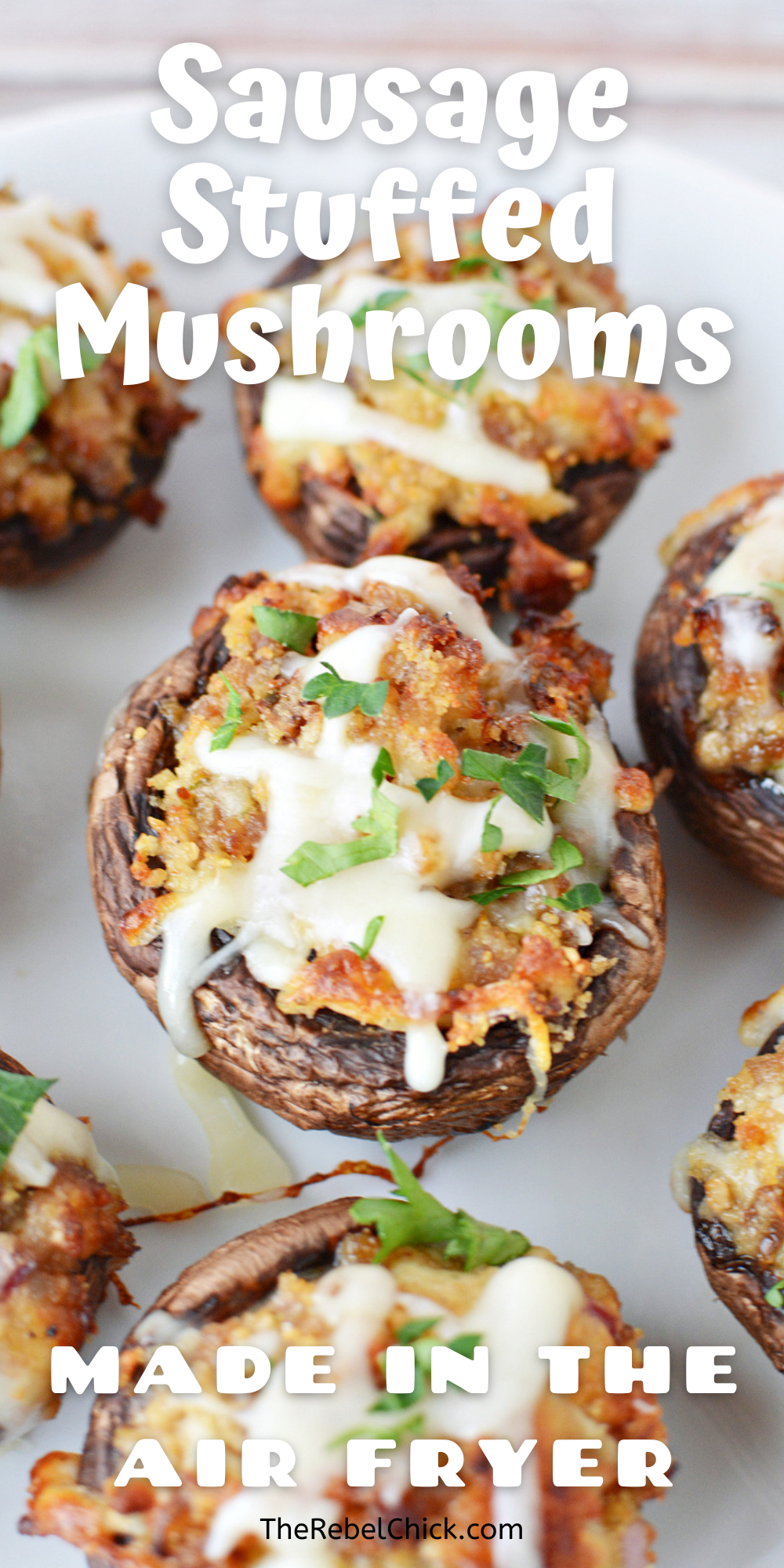 mushrooms stuffed with sausage and cheese melted on top
