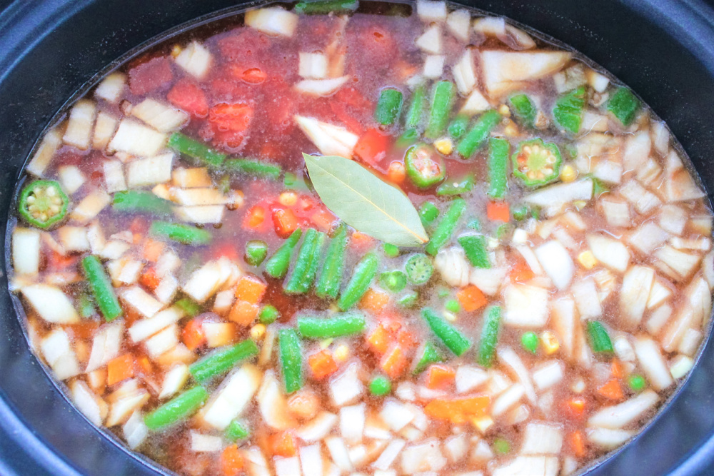 Adding vegetables to the slow cooker 