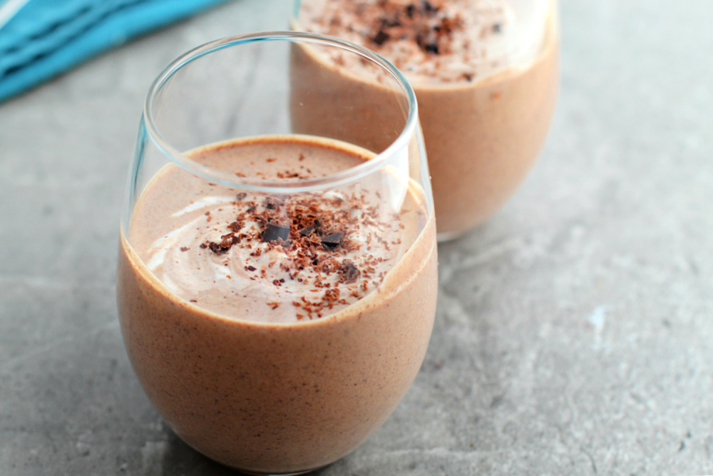 Two cups filled with homemade chocolate mousse