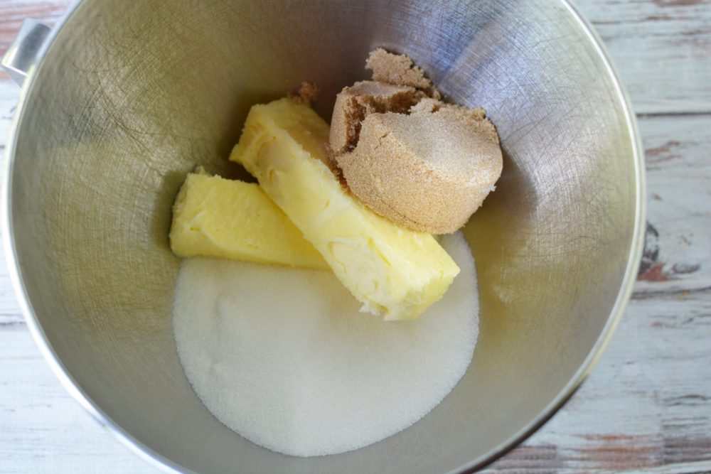 butter, white sugar, and brown sugar in a mixing bowl