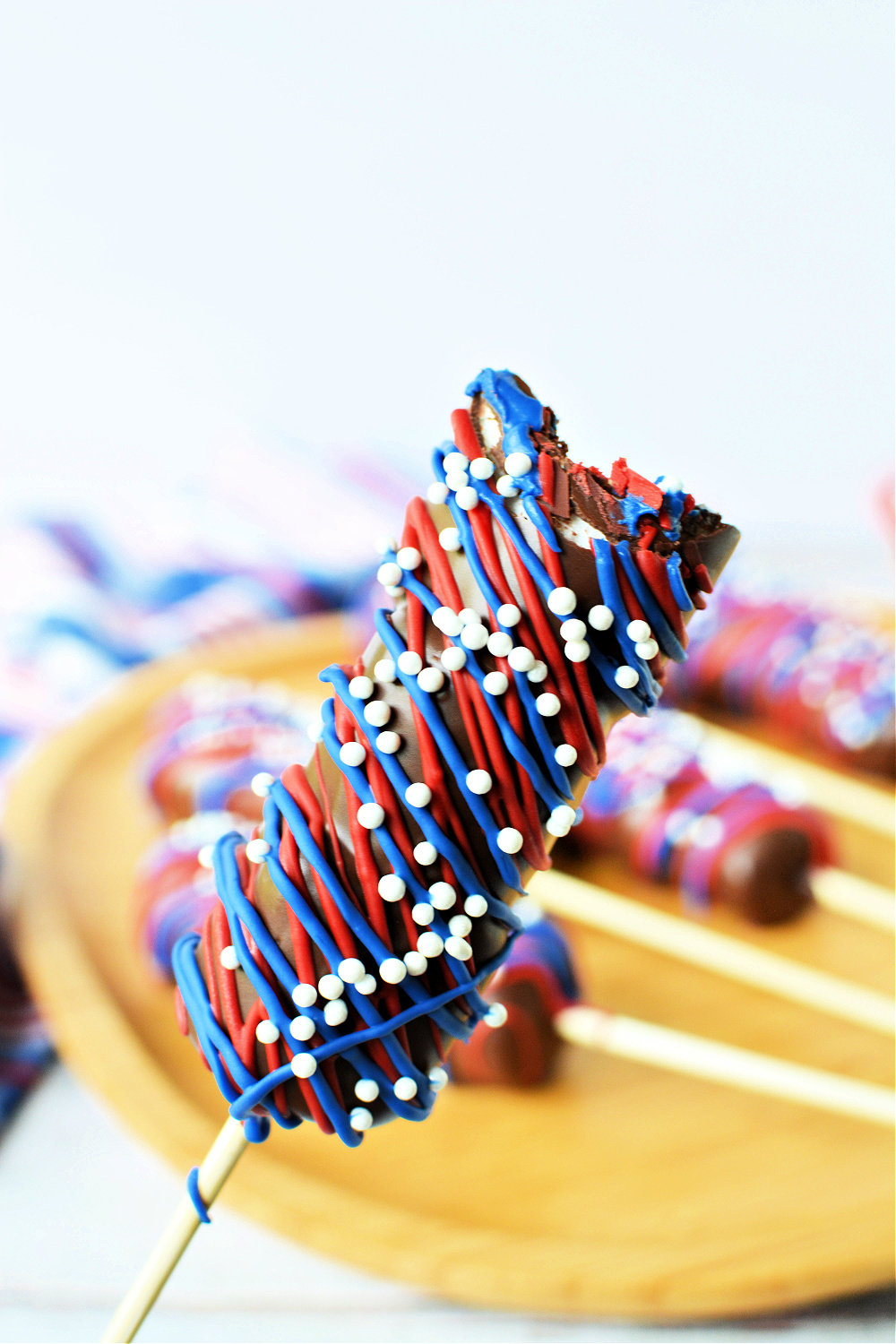 A close-up of a Red, White & Blue Marshmallow Pop