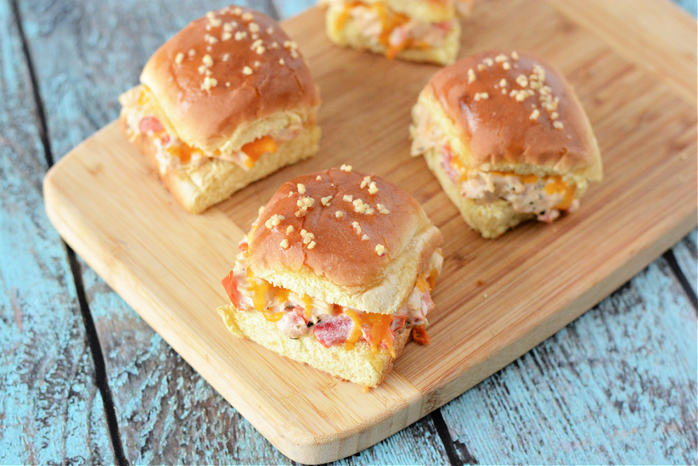 sandwich rolls filled with tomatoes, turkey and basil and garlic