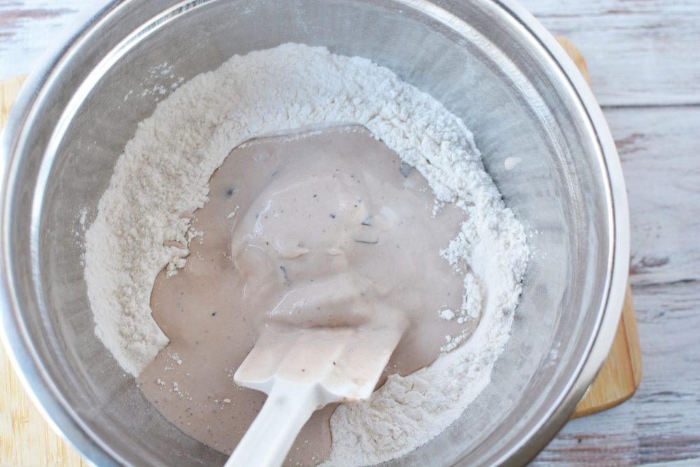 Adding chocolate ice cream to the flour mixture 