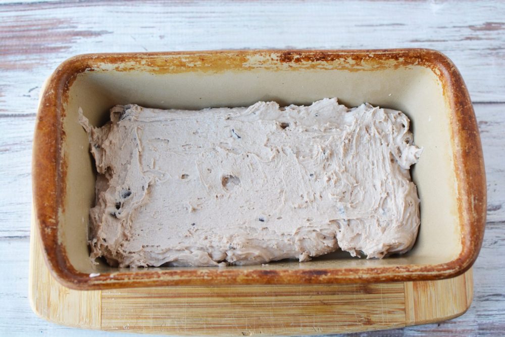 Chocolate bread batter in a loaf pan 