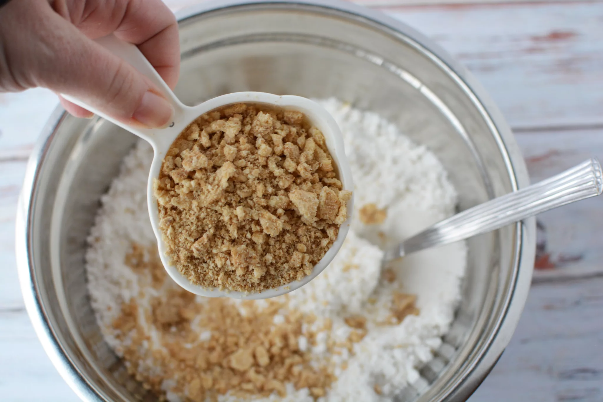 sugar cookie mix and finely crushed cereal in a large mixing bowl