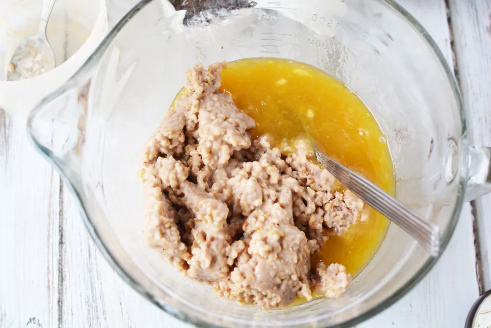 oatmeal and honey in a glass mixing bowl