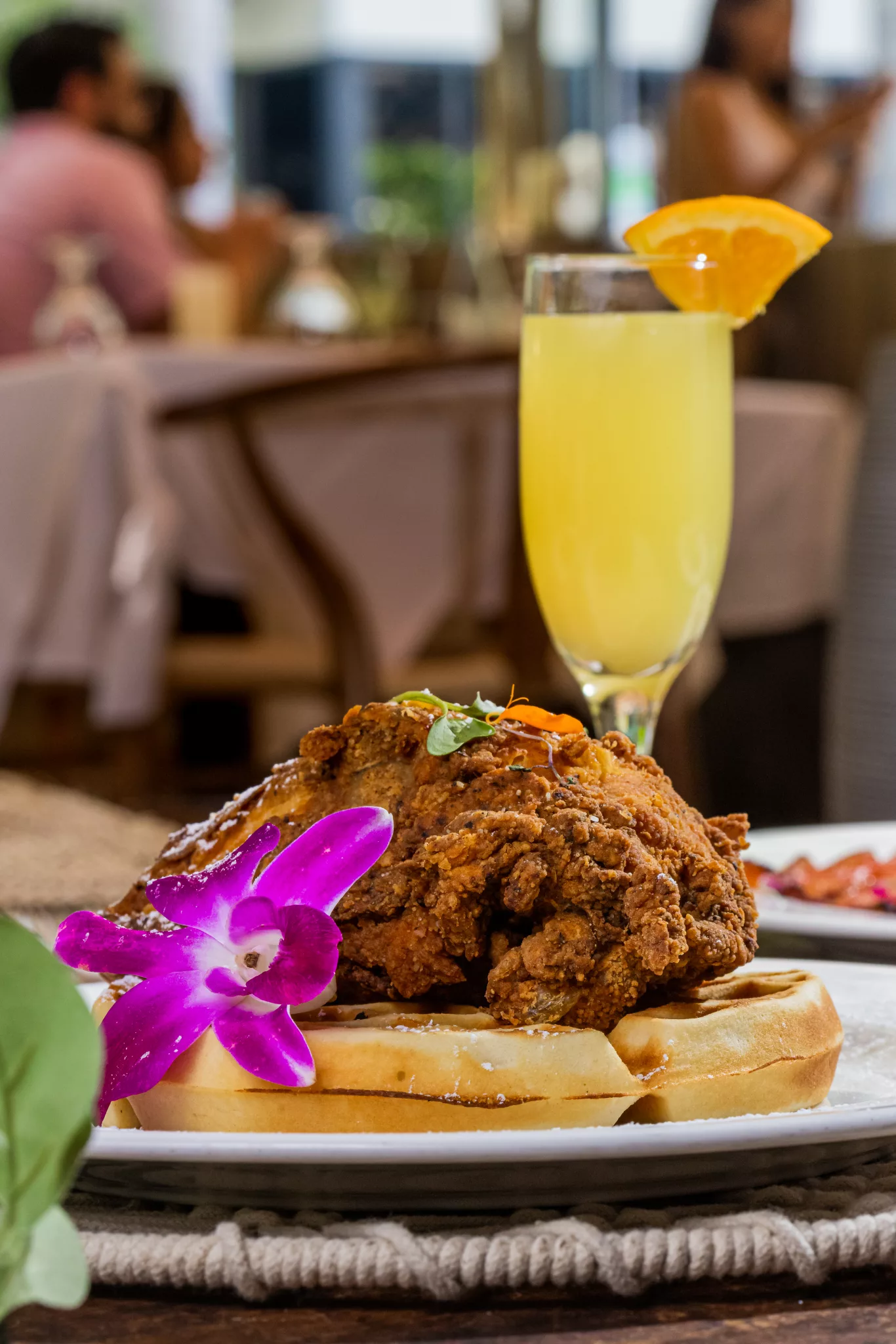 Mothers Day Brunch in Miami with friend chicken and waffles and a mimosa