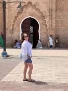 jennifer in denim shorts, a linen blend shirt in Morocco