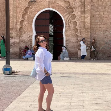jennifer in denim shorts, a linen blend shirt in Morocco