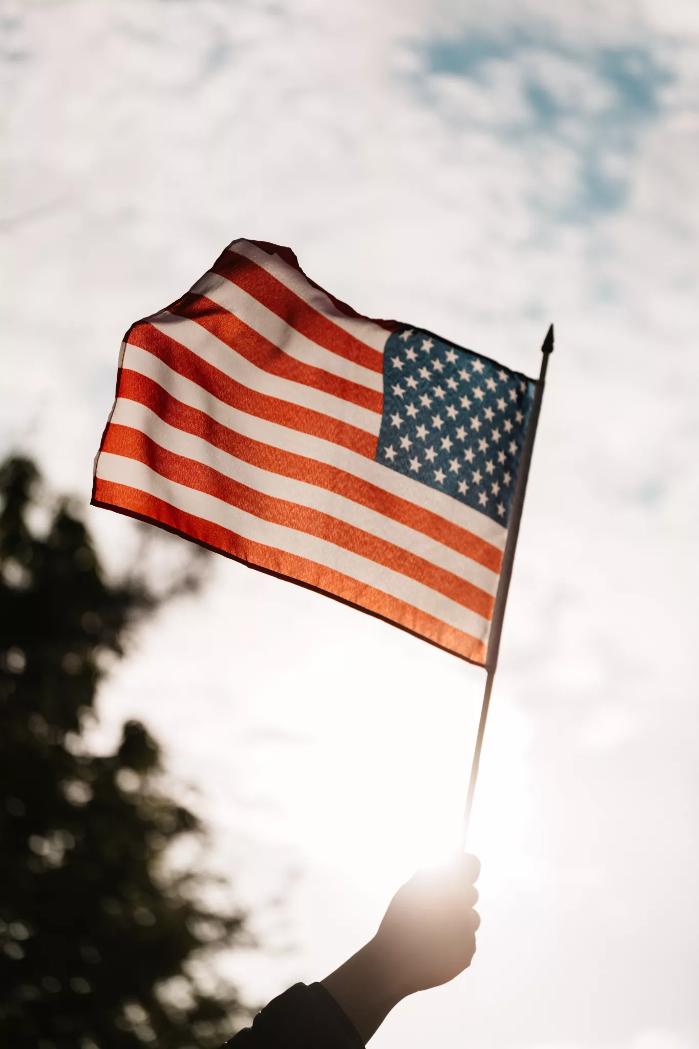 American flag being waved on Memorial Day Weekend in Miami