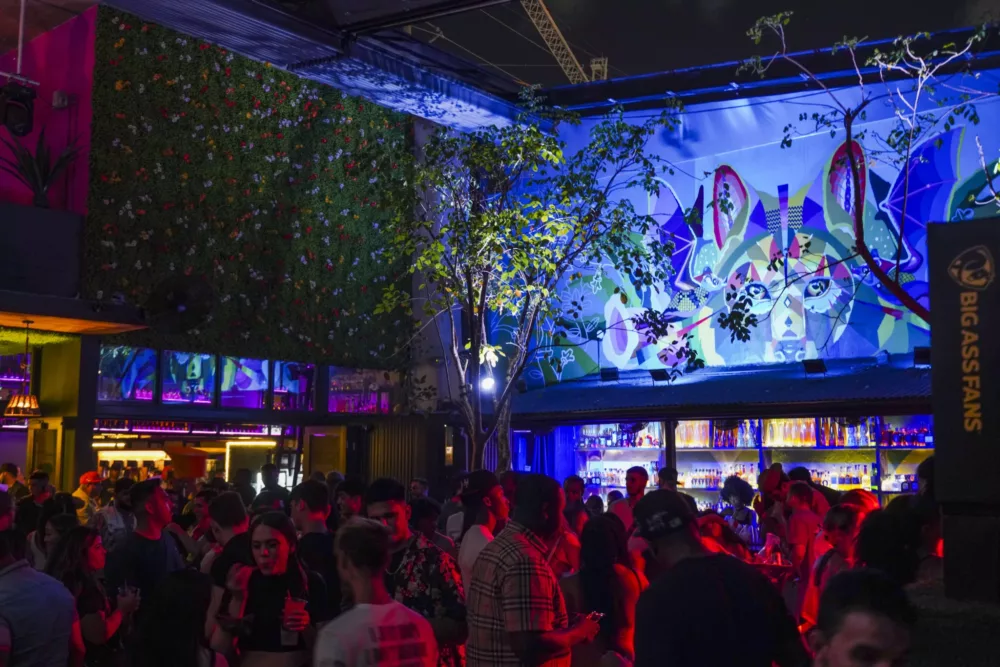 Pilos Tequila Garden Wynwood at night filled with people