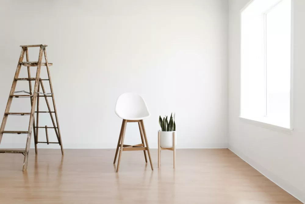 chair and ladder on hardwood floors