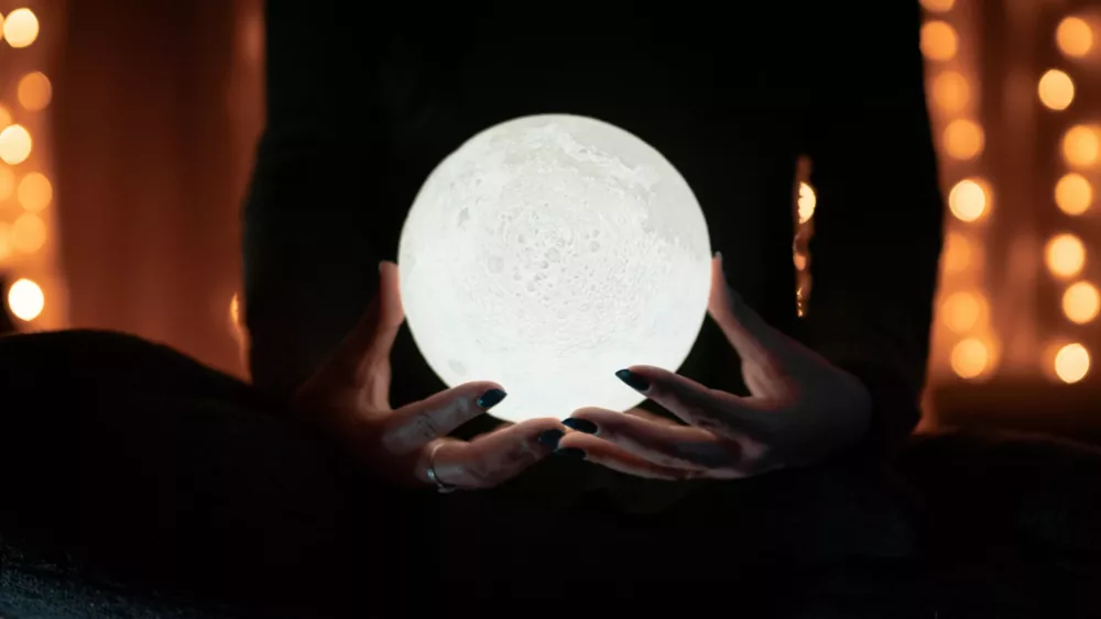 glowing sphere in someone's hands