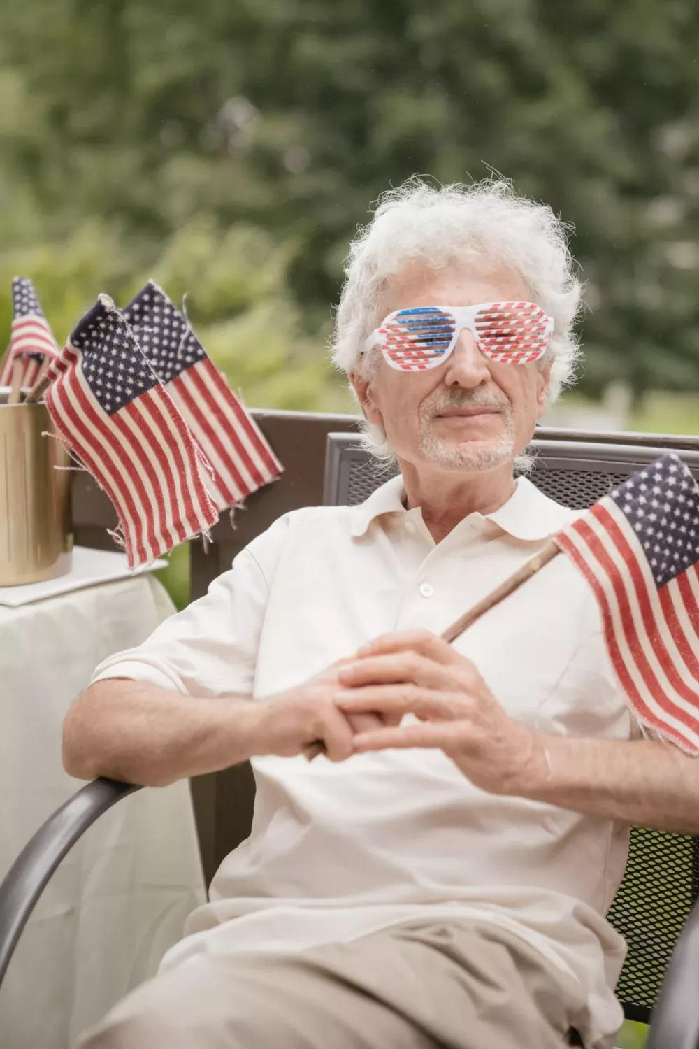 man wearing american flag sunglasses
