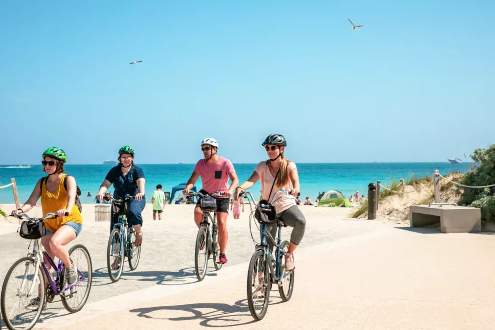 people riding bikes on Miami Beach