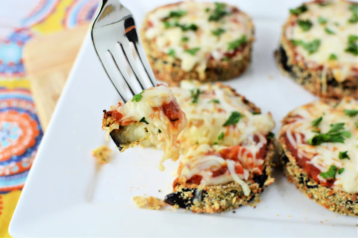 Eggplant fried in the air fryer with marinara sauce and melted mozzarella cheese on top