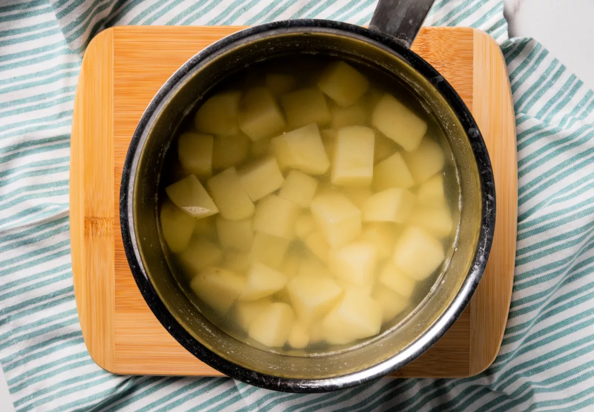 Go ahead and peel and wash your potatoes, then dice them into medium pieces. 