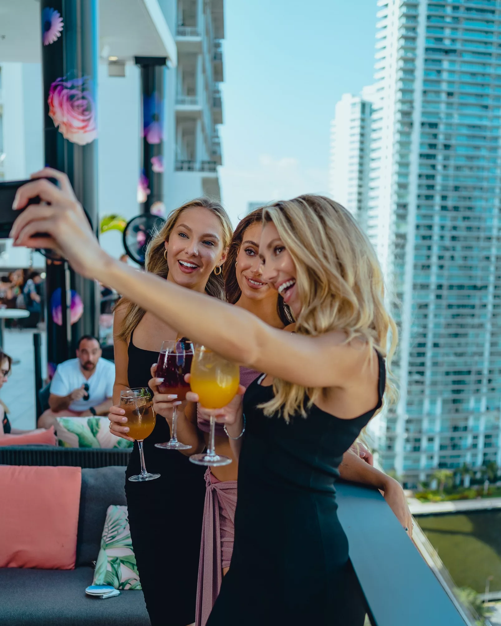 ladies at happy hour taking a selfie
