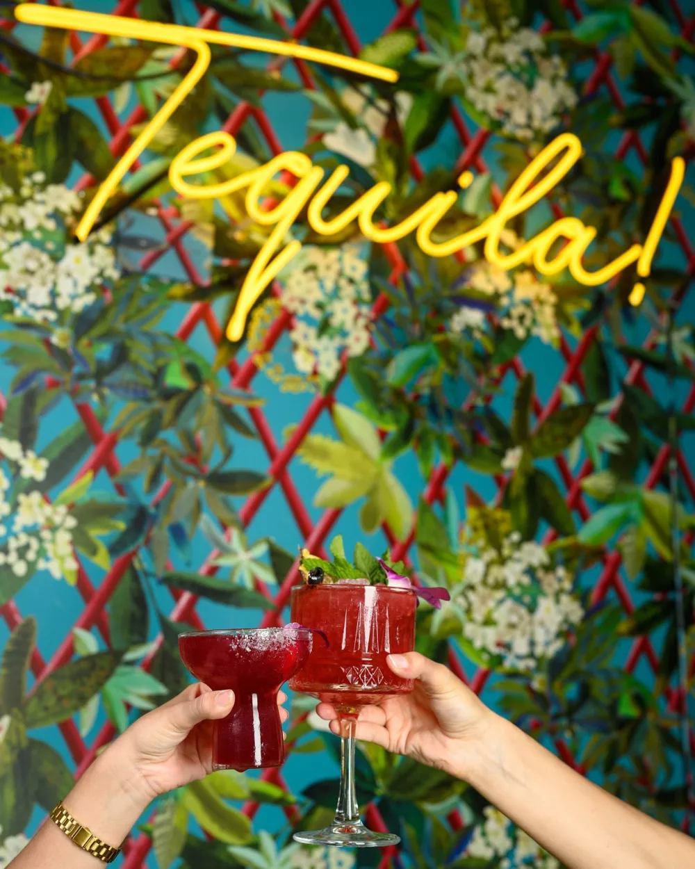 tequila cocktails against a floral backdrop