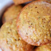 close up shot of Carrot Zucchini Muffins in a white bowl