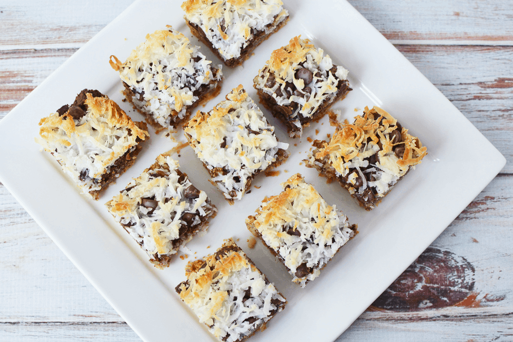 bars with chocolate chips and covered in toasted coconut flakes